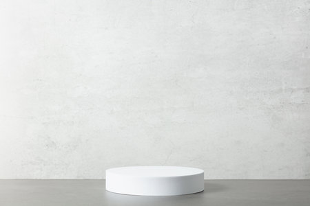 Abstract empty white podium on grey background.の写真素材