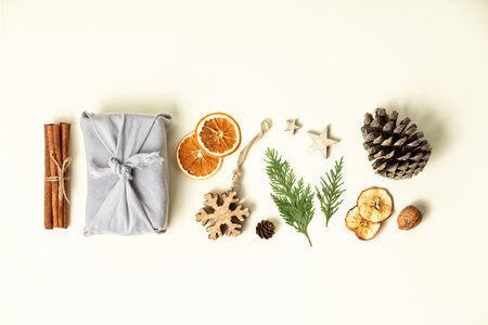 Christmas and New Year flat lay with gift boxes and decorations, eco friendly trendy zero waste packaging, holiday mood concept, making giftsの写真素材