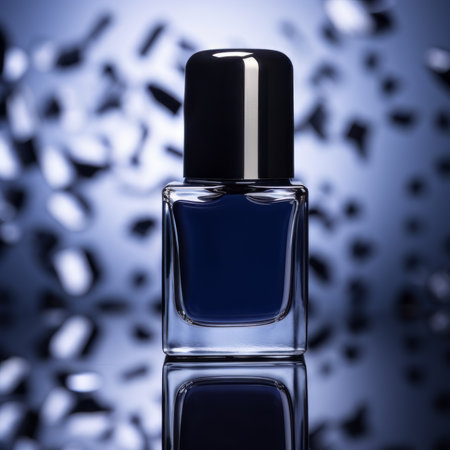 blue nail polish with metallic caps scatteredの素材