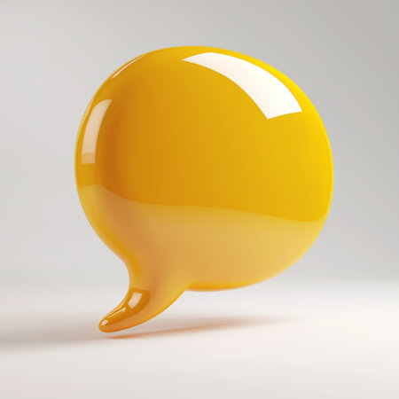 A vibrant yellow speech bubble in a 3D icon styleの素材