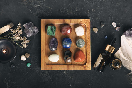Healing Crystals and Aromatherapy Display on Wooden Tray