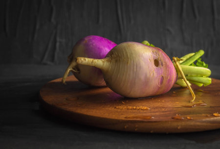 The horizontal image shows the food of the same species. It's turnips. It's whole, peeled. There are...