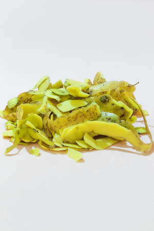 A photo with a pink background shows waste. This is the cleaning after the potatoesの写真素材