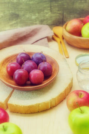 The photo shows an image of fresh and healthy raw food. This is a homemade plum from your own garden. The plum has the same size, it is wholeの写真素材