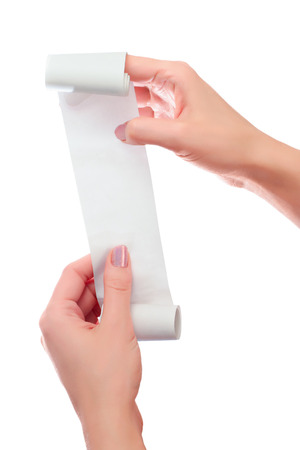 Woman or Girl Hold in Hands Roll of Paper With Printed Receipt Mock Up Template. Clean Mockup. May be Placed in Article About Shopping, Paying Bills, Finance. Copy Space & Clipping Path. On Whiteの写真素材