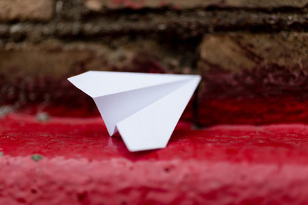 The paper airplane lies on the parapet. Action to launch aircraft in support of the Telegram...