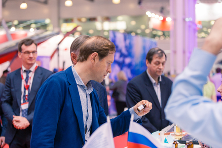 MOSCOW, RUSSIA - MAY 23, 2015: Minister of Industry and Trade of the Russian Federation Denis Manturov at the 8th International Helicopter Industry Exhibition HeliRussia 2015 in Crocus Expo.のeditorial素材