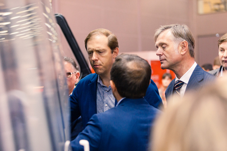 MOSCOW, RUSSIA - MAY 23, 2015: Minister of Industry and Trade of the Russian Federation Denis Manturov at the 8th Helicopter Industry Exhibition HeliRussia 2015 in Crocus Expo. Next Kazachkov Mikhail.のeditorial素材