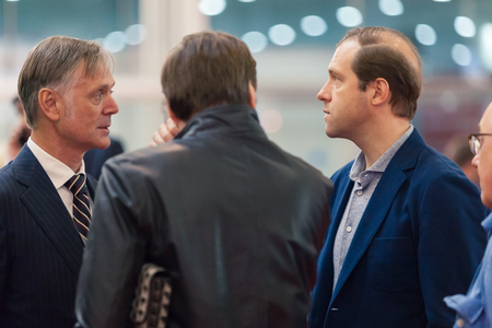 MOSCOW, RUSSIA - MAY 23, 2015: Minister of Industry and Trade of the Russian Federation Denis Manturov at the 8th Helicopter Industry Exhibition HeliRussia 2015 in Crocus Expo. Next Kazachkov Mikhail.のeditorial素材