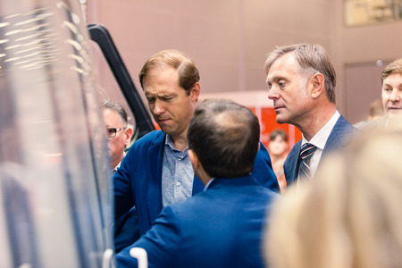 MOSCOW, RUSSIA - MAY 23, 2015: Minister of Industry and Trade of the Russian Federation Denis Manturov at the 8th Helicopter Industry Exhibition HeliRussia 2015 in Crocus Expo. Next Kazachkov Mikhailのeditorial素材