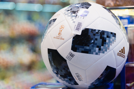 MOSCOW, RUSSIA - APRIL 30, 2018: Copy of a soccer ball with inscription TOP GLIDER match ball replica and TELSTAR emblem and ADIDAS logo of the World Cup FIFA 2018 mundial in the souvenir shop.のeditorial素材