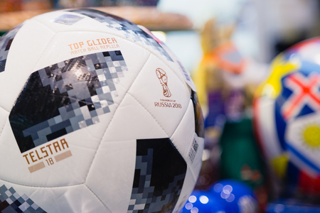 MOSCOW, RUSSIA - APRIL 30, 2018: Copy of a soccer ball with inscription TOP GLIDER match ball replica and TELSTAR emblem and ADIDAS logo of the World Cup FIFA 2018 mundial in the souvenir shop.のeditorial素材