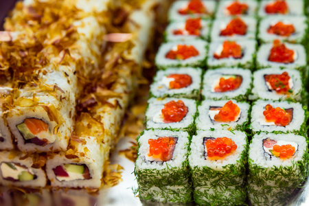 Rolls in the window in the sushi bar. Traditional Japanese food to takeaway. Organic natural...