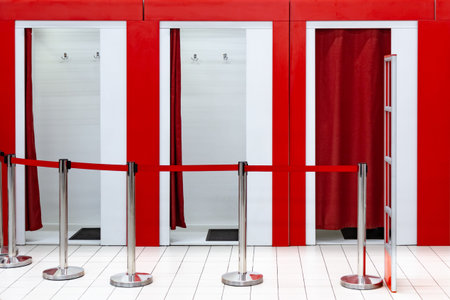 Fitting rooms in the supermarket. A clothing store with a place for fitting in the mall. Anti-theft...