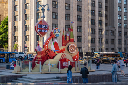 MOSCOW, RUSSIA - May 21,2018: A clock with a countdown of days, hours and minutes to the start of the FIFA World Cup 2018 in Russia at the Manege Square near Kremlin. State Duma building on backgroundのeditorial素材