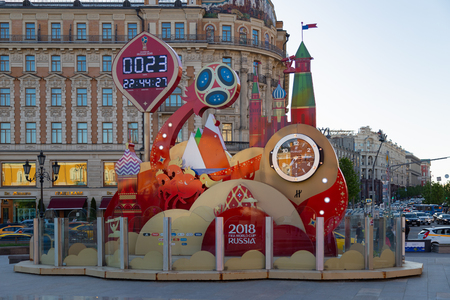 MOSCOW, RUSSIA - May 21, 2018: A clock with a countdown of days, hours and minutes to the start of the FIFA World Cup 2018 in Russia at the Manege Square near Kremlin. National Hotel on background.のeditorial素材