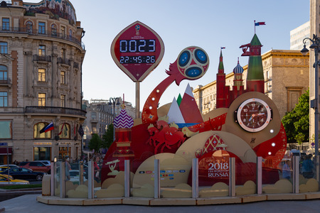 MOSCOW, RUSSIA - May 21, 2018: A clock with a countdown of days, hours and minutes to the start of the FIFA World Cup 2018 in Russia at the Manege Square near Kremlin. National Hotel on background.のeditorial素材