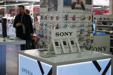 MOSCOW, RUSSIA - APRIL 6, 2018: Buyer at SONY showcase in MediaMarkt store in Yerevan Plaza shopping mall. The Safmar group agreed to purchase a network of home appliances and electronics Media Markt.のeditorial素材