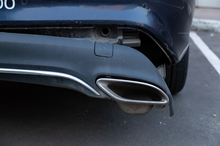 MOSCOW, RUSSIA - AUGUST 17, 2018: A CLA 200 car Mercedes Benz from car sharing company "Belka car" on toll parking. Rear bumper fell off after a traffic accident. Road crash. Damaged German automobileのeditorial素材