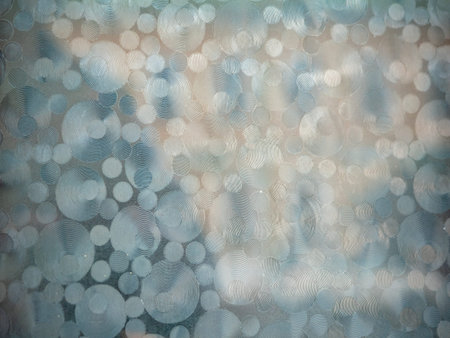 Glass surface with decorative elements on surface. Background for design. Frost imitation on window....