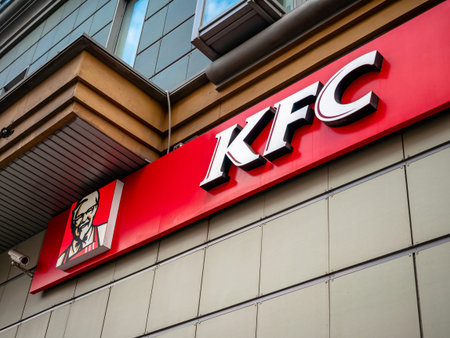 Moscow, Russia - September 14, 2019: KFC logo on advertising sign in a shopping center. A popular fast food restaurant in the city. Kentucky fried chicken cafe signのeditorial素材