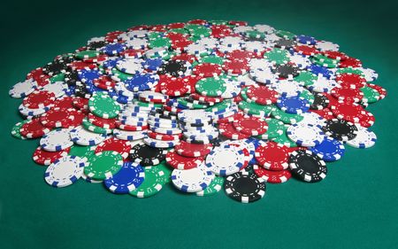 Pile of chips on a professional filt pokertableの写真素材