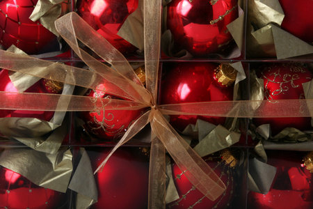Christmas background with beautiful old fashioned christmas decorations wrapped in a box