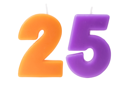 Colorful birthday candles in the form of the number 25 on white backgroundの写真素材