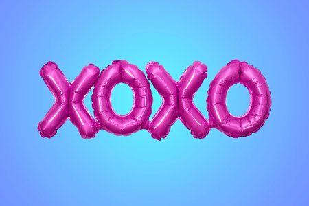 Inflated party balloon forming the letters XOXO meaning hugs and kisses