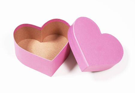 Giftbox in the shape of a heart isolated on white backgroundの写真素材