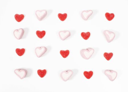 Rows of heartshaped candy treatsの写真素材