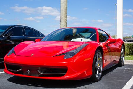 Miami, FL, USA  April 16, 2019: Red Ferrari  parking on the side road. Ferrari Luxury Italian sports carのeditorial素材