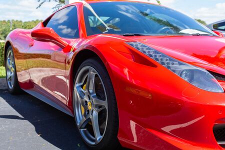 Miami, FL, USA  April 16, 2019: Red Ferrari  parking on the side road. Ferrari Luxury Italian sports carのeditorial素材