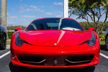 Miami, FL, USA  April 16, 2019: Red Ferrari  parking on the side road. Ferrari Luxury Italian sports carのeditorial素材