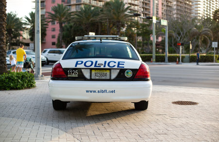 Sunny Isles Beach, FL, USA - April 14, 2019: Police car parked in the street of Sunny Isles Beach,...