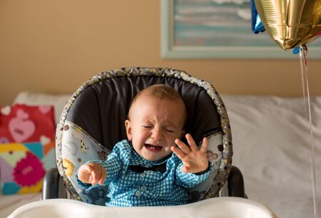 One year old cute boy crying.の写真素材