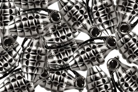 Many artifical silver grenades on white backgroundの写真素材