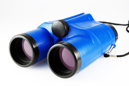 Blue binocular isolated on whiteの写真素材