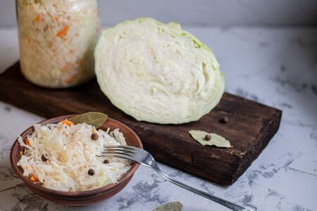 Plate with sour cabbage. This is a useful fermented product. Sour cabbage is rich in vitamins and is used in many dishes of different nations. The fermentation process does not destroy nutrients.の写真素材