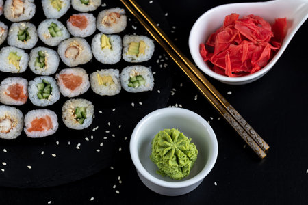 Sushi with fish, with cucumber, with eel, with avocado. Wrapped in Nori Seaweed. Food for...