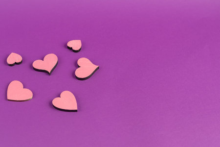 Mother's Day, Women's Day, Valentine's Day or birthday on a lilac background. Hearts of different...