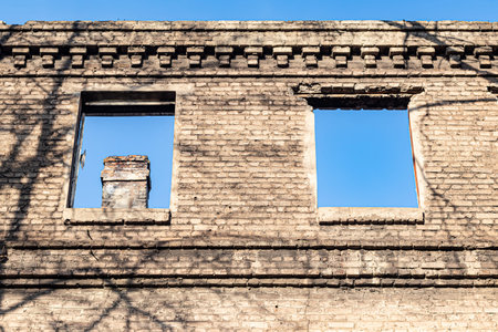Ruined old house. And the blue sky. The remains of old houses. Abandoned city. The city of ghosts....