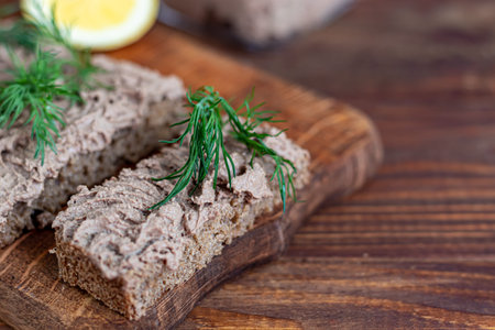 Fresh homemade chicken liver pate with carrots, onions and butter. Garnished with a sprig of dill....