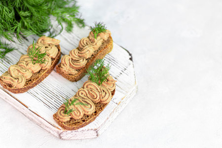 Fresh homemade chicken liver pate with carrots, onions and butter. Garnished with a sprig of dill....