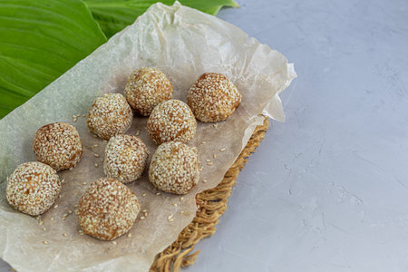 Energy bites without baking are made from ingredients - nuts, cocoa, chocolate, oats and sesame...