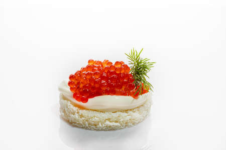 Red caviar on a white background. Isolate. Healthy food concept. Copy space.の写真素材
