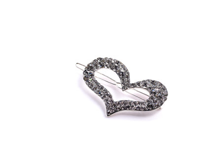 Bijouterie and jewelry on a white background. Brooches and hairpins, earrings and pendants. Isolate. Copy spaceの写真素材