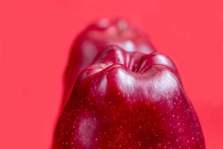 Red apples on a colored background. selective focus. harvesting. Health food. copyspace.の写真素材