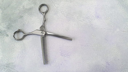 Special hairdressing scissors and comb. Professional equipment.