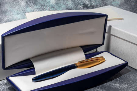 Fountain pen on a marble and gray background. Selective focus.の写真素材